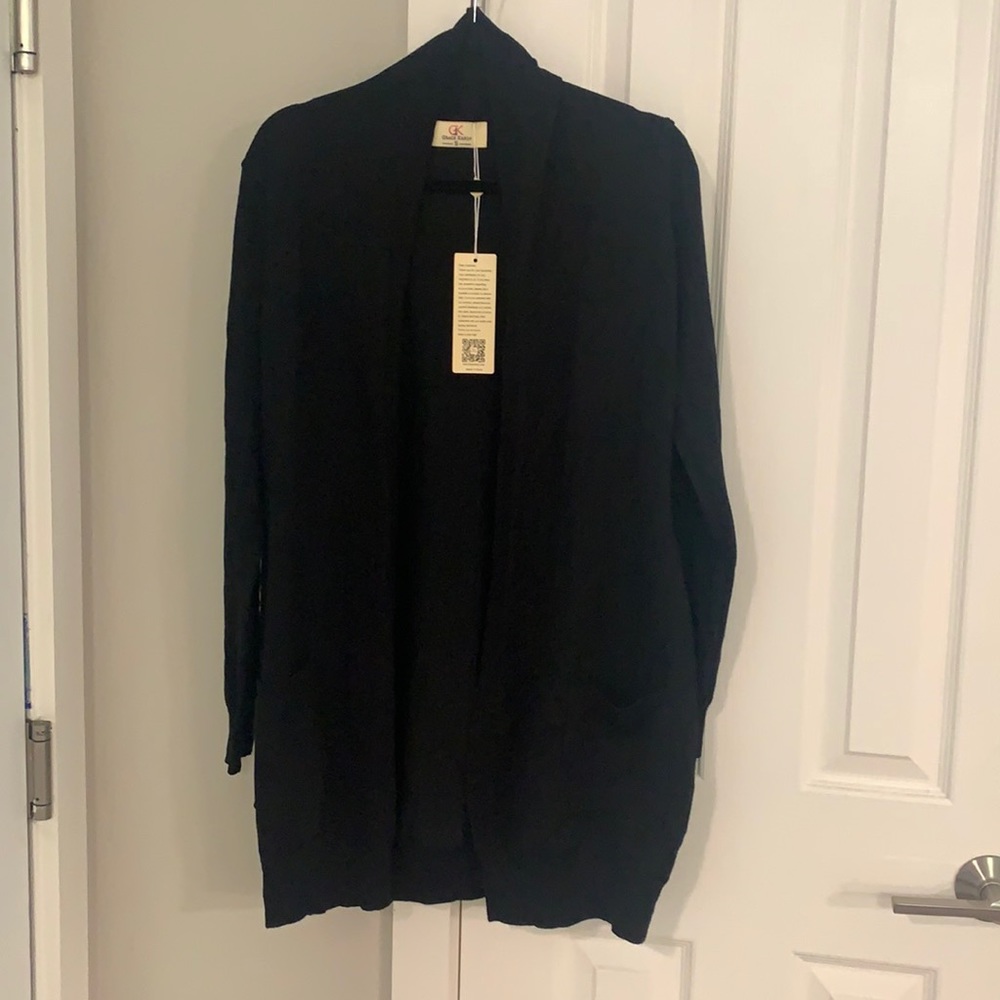 Size small black cardigan never worn